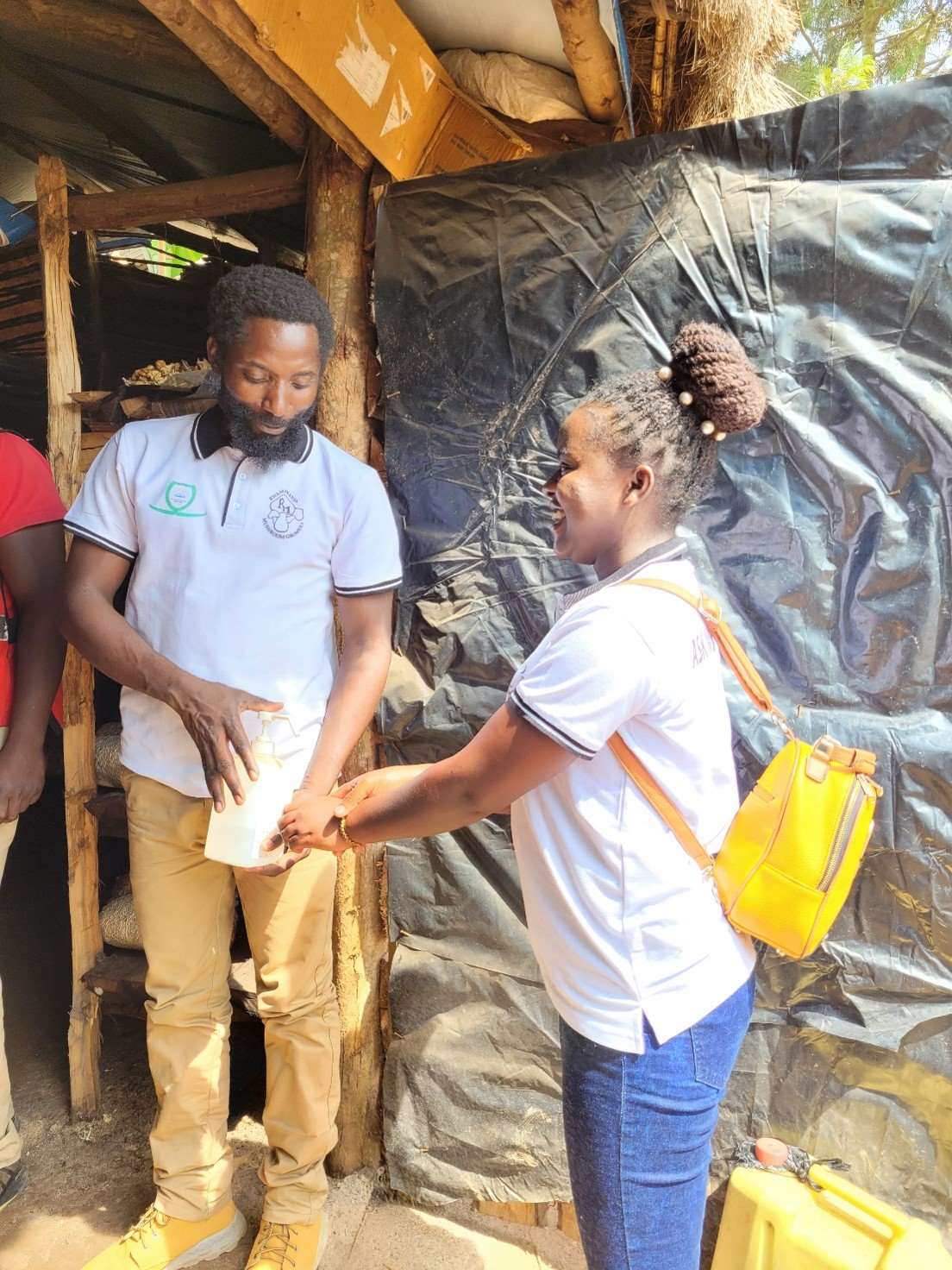 Bemerik and Jackline from the Rwamwanja Rural Foundation team talk about santiation in mushroom production